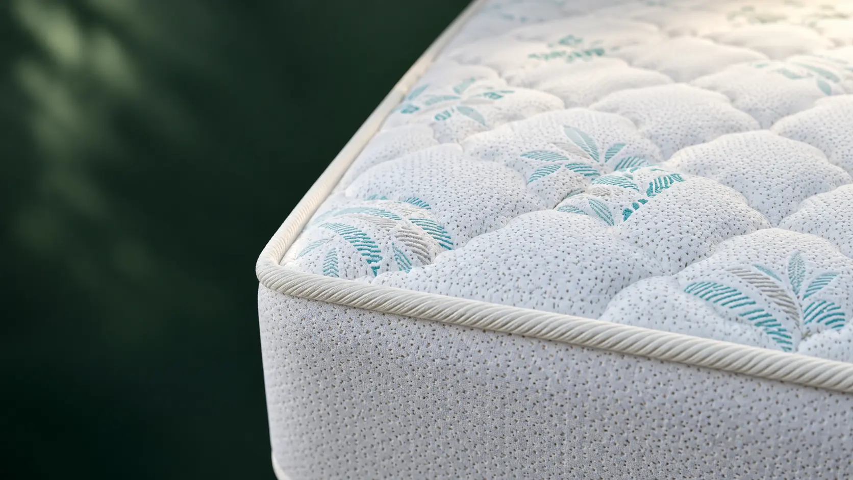 Close view of the Premium mattress fabric, quilting and edge piping